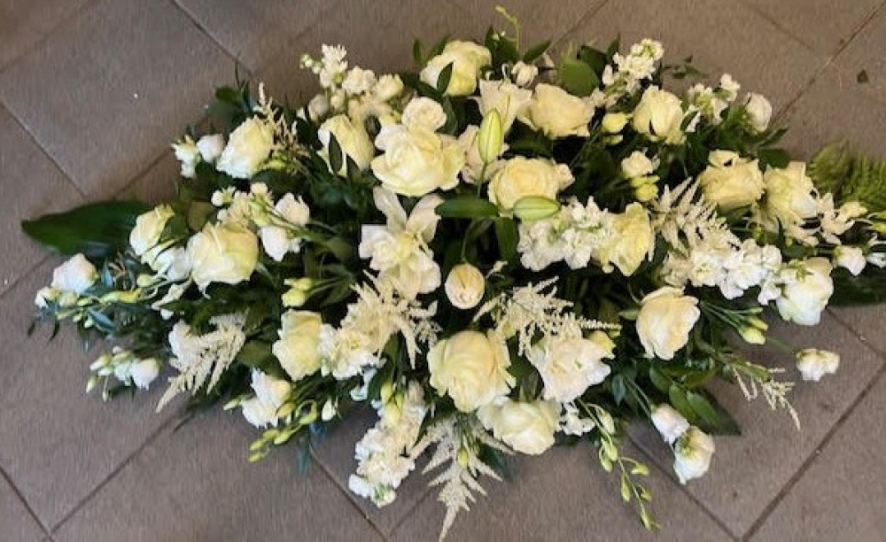 Classic cream and white casket spray