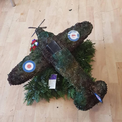 Spitfire Funeral Tribute - A floral arrangement made into the shape of the iconic Spitfire.